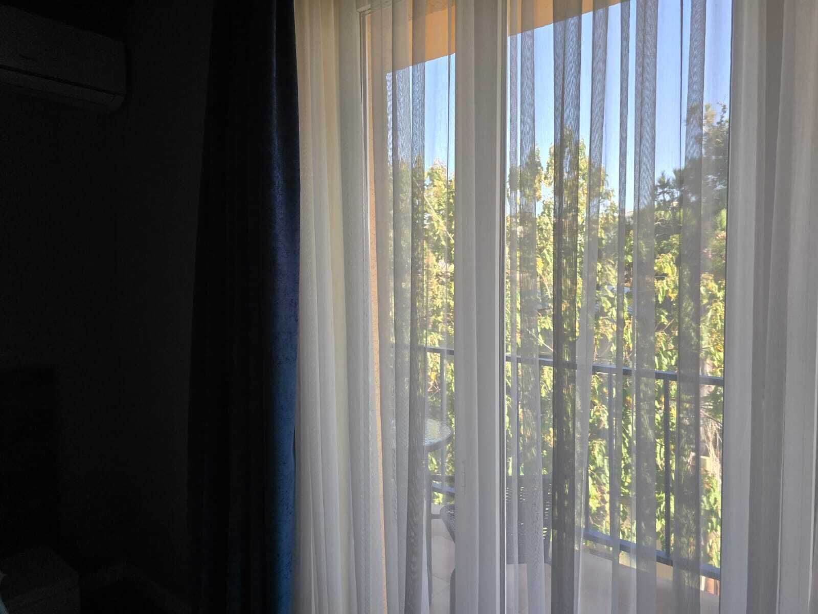 Deluxe Double or Twin Room | Living area | 90-cm Smart TV with digital channels, heated floors