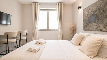 Standard Studio, Courtyard View | Living area | 80-cm Smart TV with digital channels