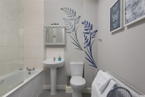 Hair dryer, towels, soap, toilet paper