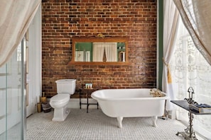 Shower, hair dryer, towels, shampoo