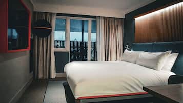Club Room with Balcony (Free Gym & Pool) | Desk, laptop workspace, blackout curtains, iron/ironing board