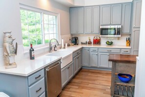 Family House | Private kitchen | Mini-fridge, microwave, dishwasher