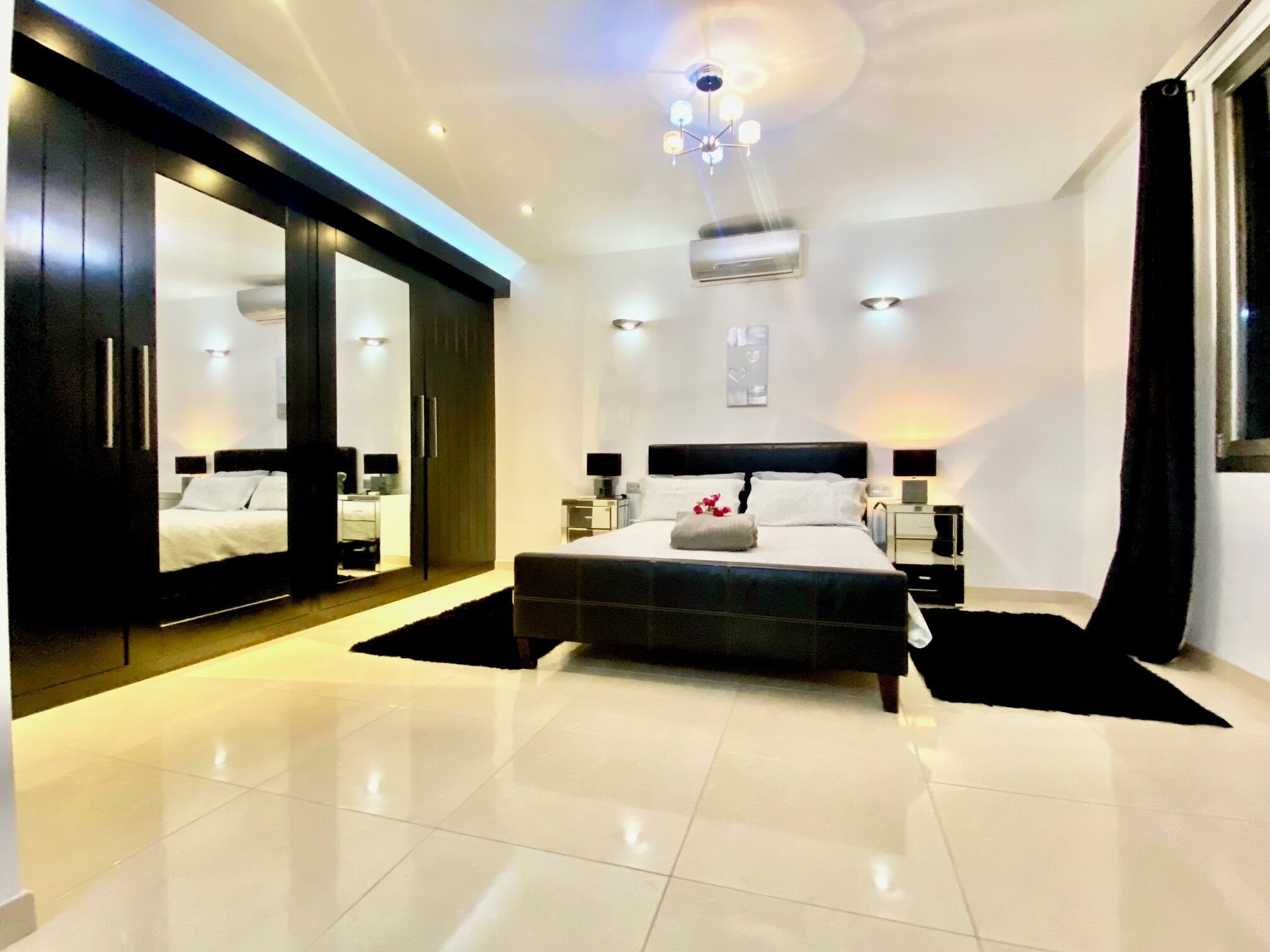 5 bedrooms, in-room safe, iron/ironing board, free WiFi