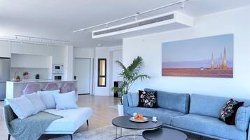 Luxury Penthouse, Sea View | Living area | 127-cm Smart TV with digital channels