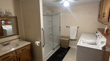 Shower, towels, soap, toilet paper