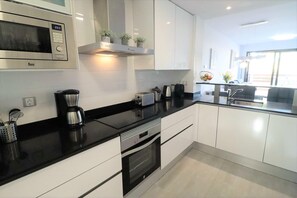 Fridge, microwave, oven, dishwasher