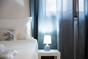 2 habitaciones, tabla de planchar con plancha, wifi y ropa de cama