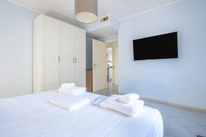 2 habitaciones, tabla de planchar con plancha, wifi y ropa de cama