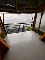 Deluxe Cottages | Balcony