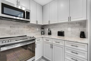 Condo, Multiple Beds (Portofino Island Resort 1-1708) | Private kitchen | Spices, reusable coffee/tea filters - Portofino Island Resort 1-1708 (Pensacola Beach)