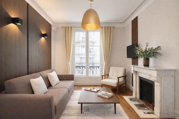Signature Apartment, Courtyard View | Living area | 80-cm Smart TV with digital channels
