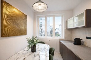 Signature Apartment, Courtyard View | Private kitchen | Espresso maker, electric kettle, toaster, freezer