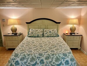 1 bedroom, desk, iron/ironing board, travel crib