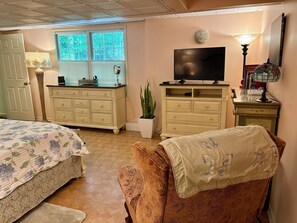 1 bedroom, desk, iron/ironing board, travel crib