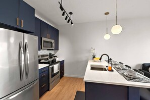 Microwave, oven, stovetop, dishwasher - Stylish 1B in DT Minneapolis, Minutes to Minneapolis Convention Center & US Bank (Minneapolis)