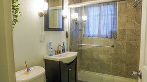 Shower, towels, soap, toilet paper