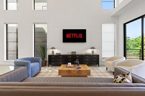 TV connectée, jeux vidéo, table de tennis de table, livres