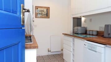 Lava-louças, talheres/pratos/utensílios de cozinha