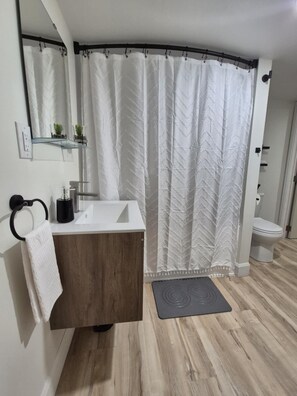 Hair dryer, towels, soap, toilet paper - Cozy Private Bachelor Unit King Size bed. (Riverview)