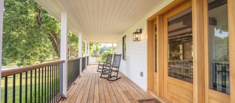 Designer 5-bedroom farmhouse with private lake access in rural Monmouth Maine.
