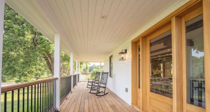Designer 5-bedroom farmhouse with private lake access in rural Monmouth Maine.