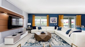 House, Multiple Beds, Pool Access, Pool View (601PBD CG NEW) | Living area | 42-inch flat-screen TV with digital channels - Enchanting Moana & Hogwarts Rooms Close to Parks (Davenport)