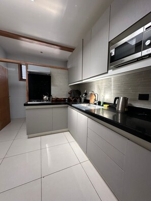 Family Apartment | Private kitchen - Hotel Inside (Santiago)