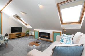 Televisie en een open haard