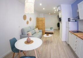 Apartamento clássico, vista para o parque, ao lado da praia | Área de estar