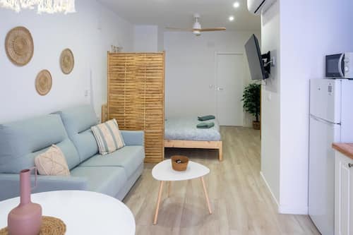 Apartamento clásico, vistas al parque, junto a la playa | Zona de estar
