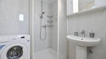 Hair dryer, towels, soap, toilet paper