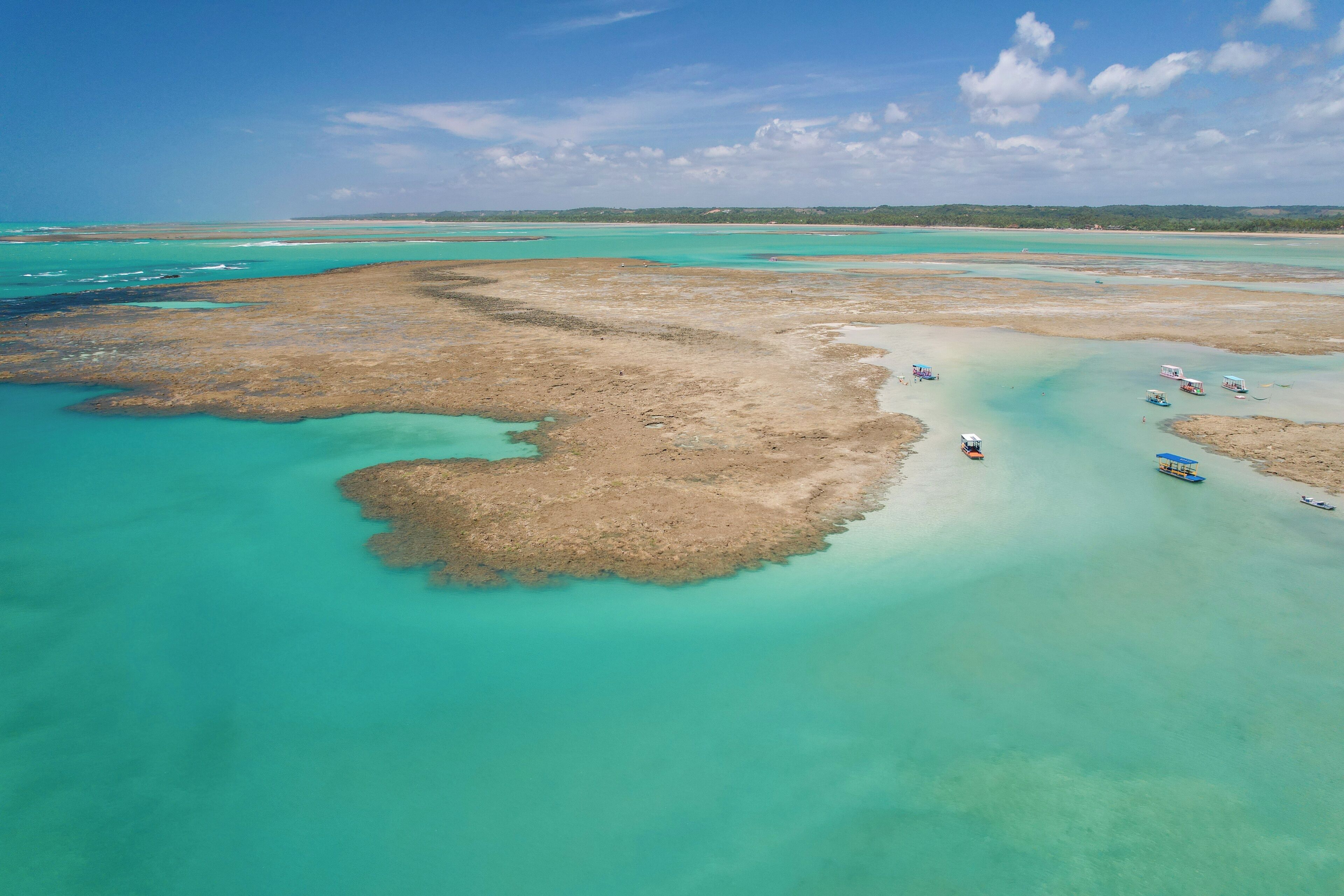 On the beach, beach umbrellas, beach towels, beach massages