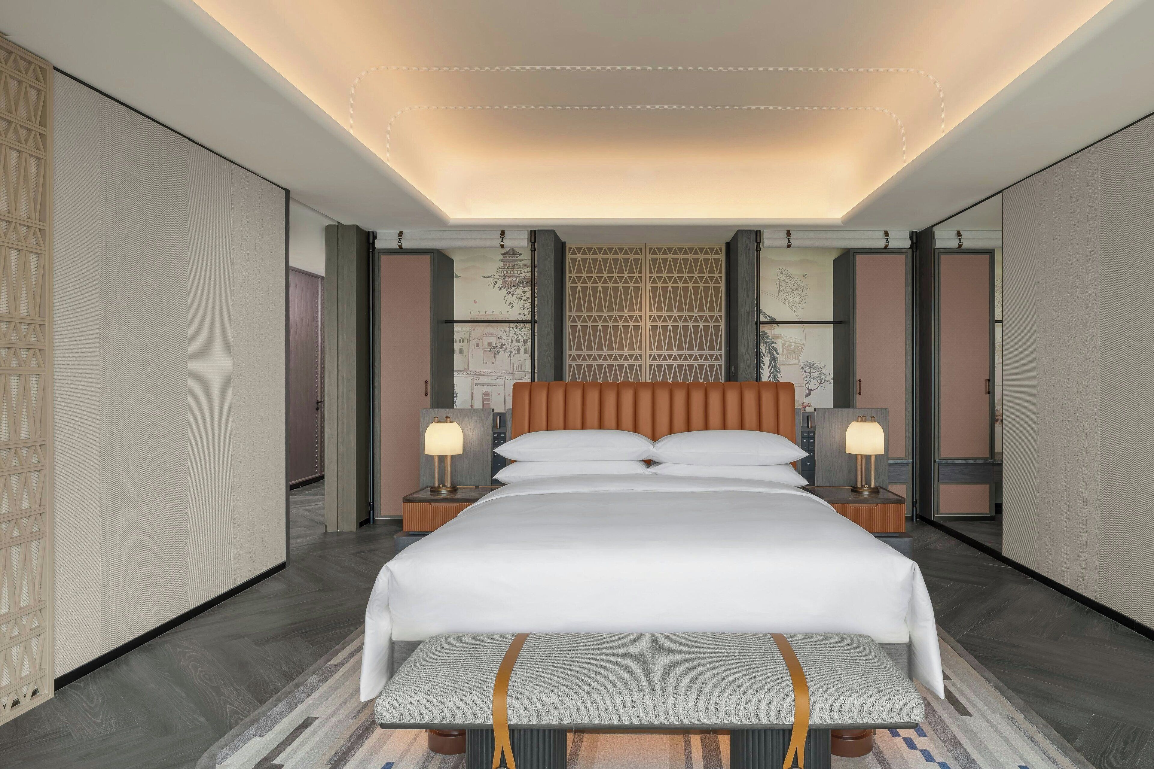 Suite – executive, 1 soverom | Dundyner, minibar, safe på rommet og blendingsgardiner