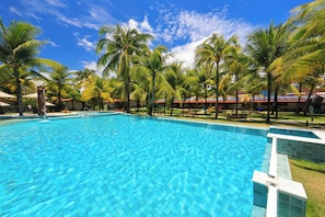 Outdoor pool, open 8:00 AM to 8:00 PM, pool umbrellas