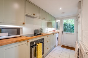 Fridge, microwave, oven, cookware/dishes/utensils