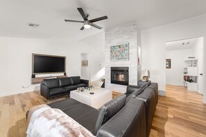 Smart TV, fireplace, books