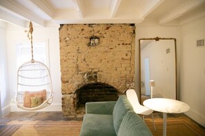 TV, fireplace, books, video library