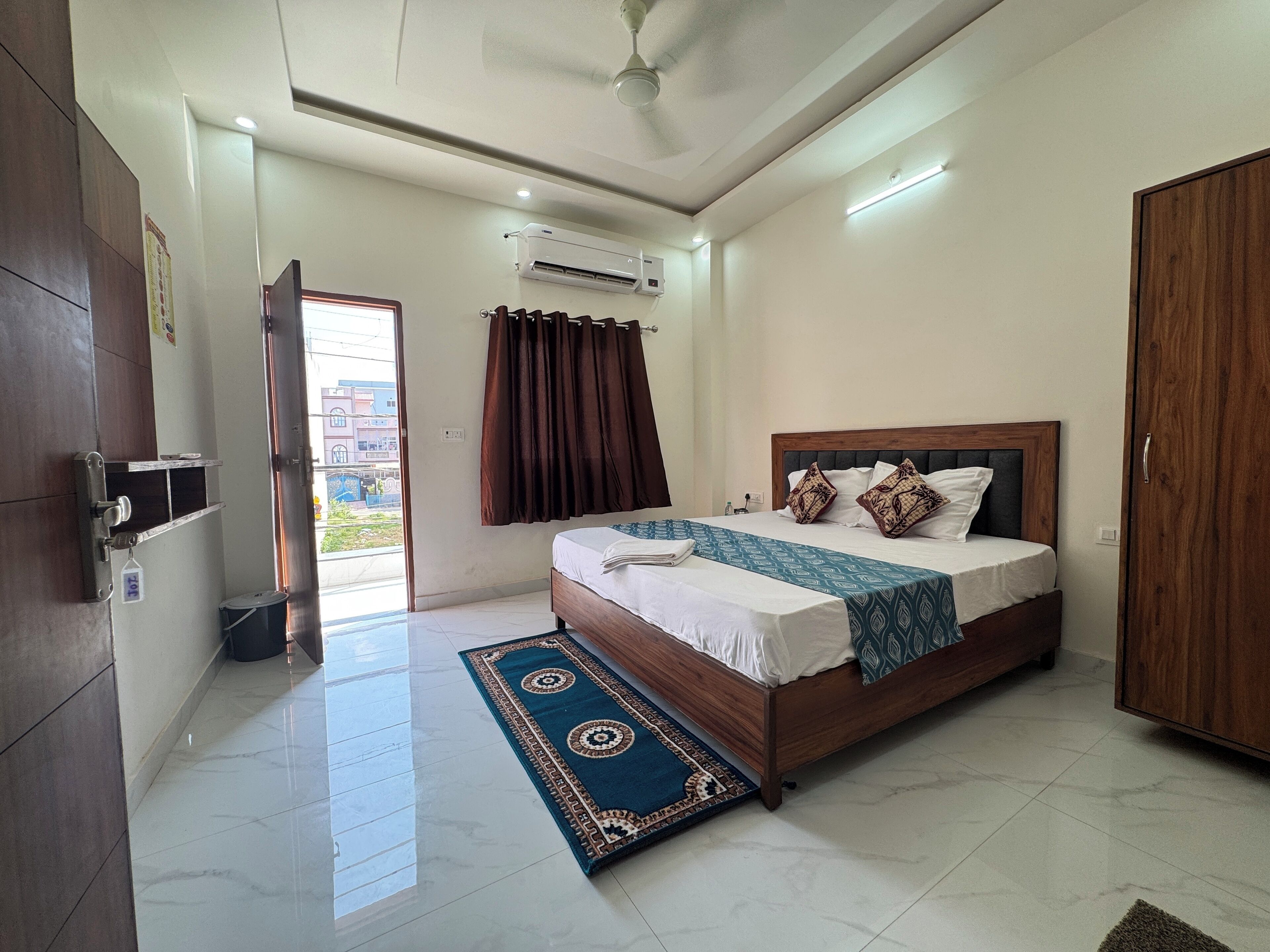 Deluxe Room, Balcony, City View | Laptop workspace, free WiFi