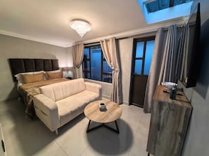 Family Room, 1 Bedroom, Courtyard View | Premium bedding, down duvets, individually decorated - Bryanston Palms Accommodation (Sandton)