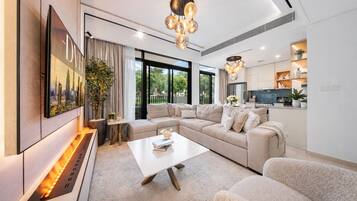 Signature Villa, Garden View | Living area | 55-inch Smart TV with digital channels, Netflix, streaming services