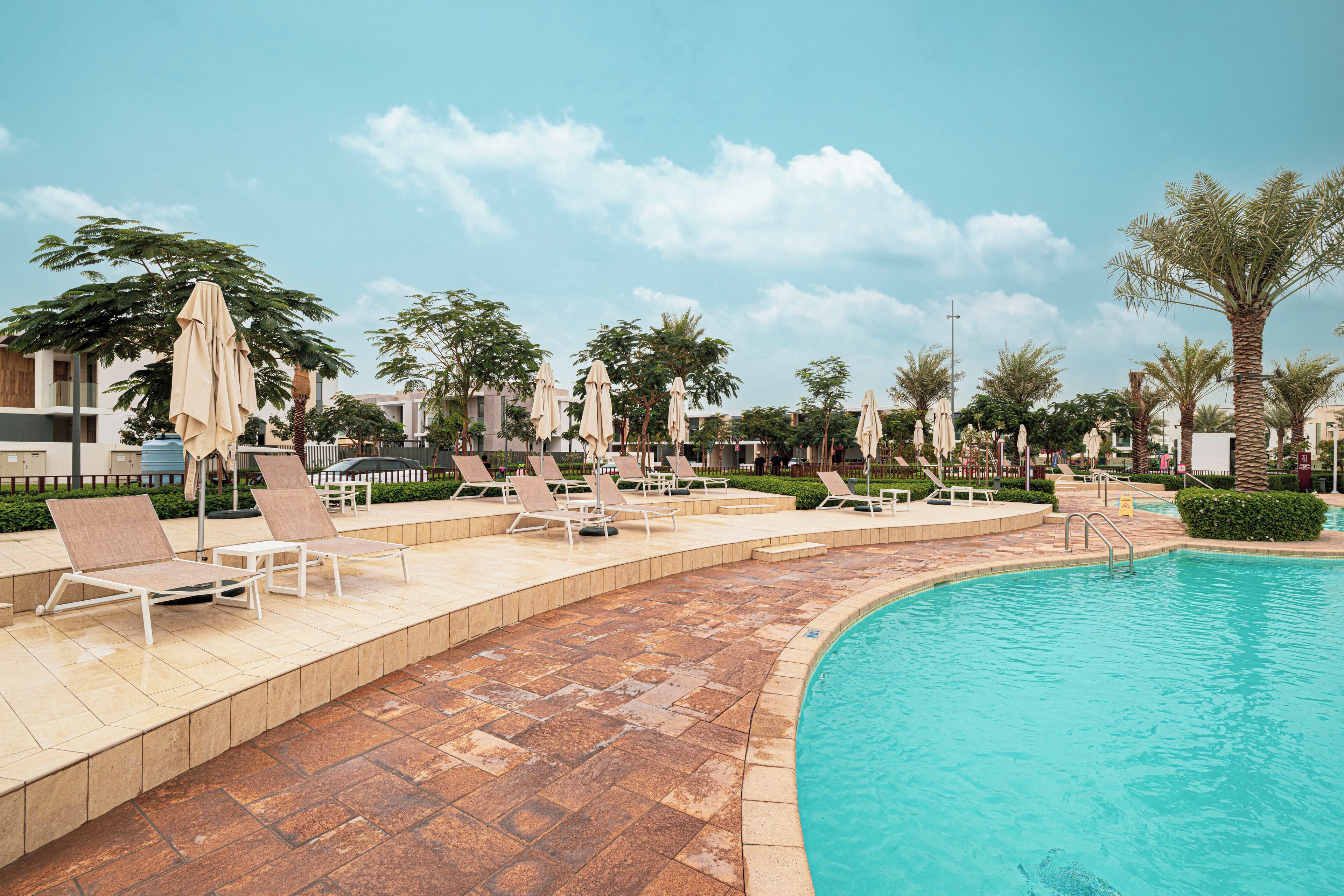 4 outdoor pools, open 9:00 AM to 9:00 PM, pool umbrellas, sun loungers