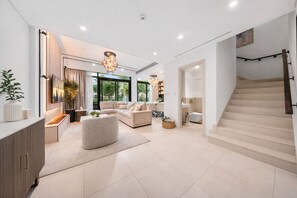 Signature Villa, Garden View | Living area | 55-inch Smart TV with digital channels, Netflix, streaming services