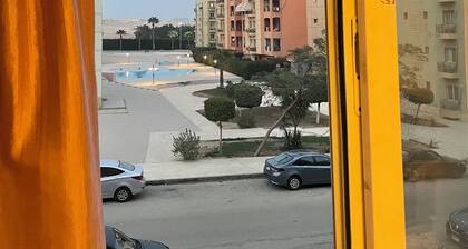 Cozy 1-bedroom apartment with WiFi, AC in lovely 6th of October City