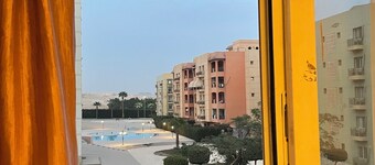 Cozy 1-bedroom apartment with WiFi, AC in lovely 6th of October City