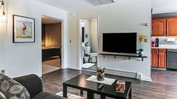 1 bedroom, desk, iron/ironing board, travel crib