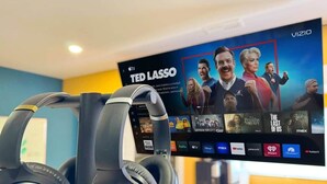 A TV displaying a sports show with a selection of streaming services. - Private Studio/1 Min-Hospital/Self Check-In/75" TV (Williams Lake)