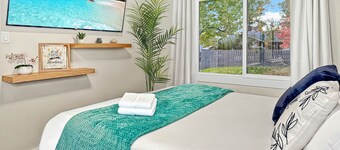 Cozy Suite | 5 Min to DT | Self Check-In | 75" TV