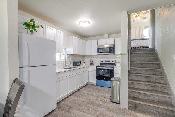 Fridge, microwave, stovetop, coffee/tea maker