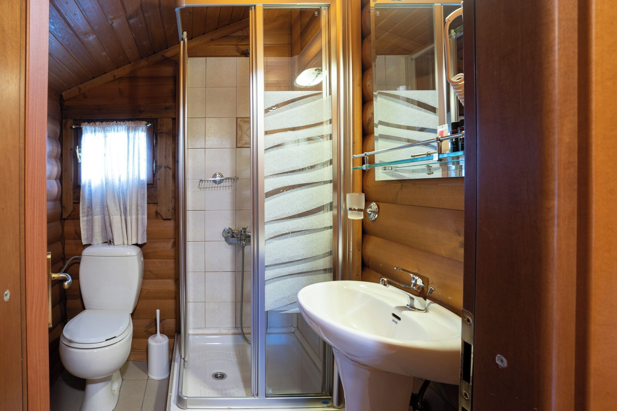 Shower, free toiletries, hair dryer, slippers