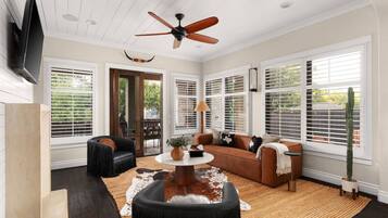 Smart TV, fireplace, table tennis, books